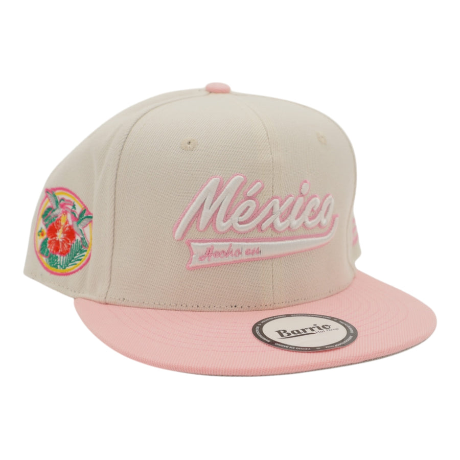 Beige and pink cap with 'Mexico' and floral design on a white background